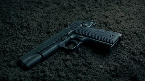 Gun On The Ground Outside Tracking Shot