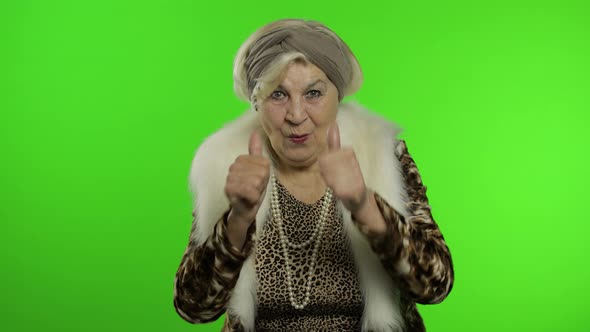 Elderly Stylish Grandmother. Caucasian Woman Claps Her Hands. Chroma Key