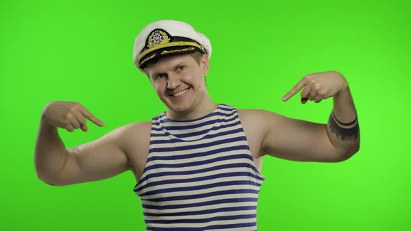 Young Sailor Man Pointing Oneself with Fingers Proud and Happy. Seaman Guy