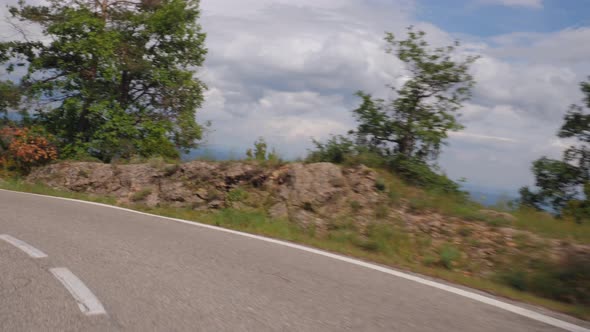 Timelapse Shot Driving Car in Windy Countryside Road