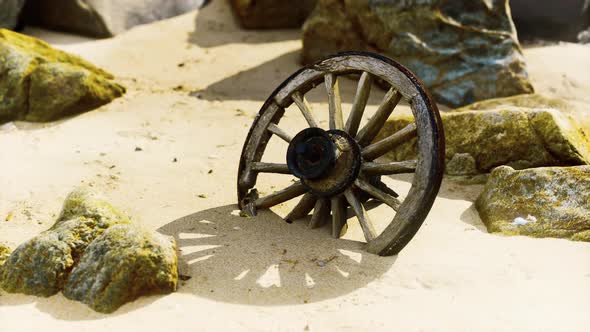 Old Tradition Waggon Wheel on the Sand