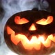 Shining Jack-O-Lantern. Halloween Pumpkin with Scary Face Smoke Inside with Flame. - VideoHive Item for Sale