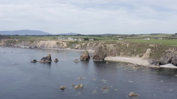 Picturesque cliff top Annestown Ireland with hidden beaches below