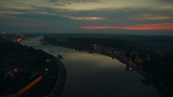 Aerial view of the Drava river and the city at sunset in Osijek, Croatia.