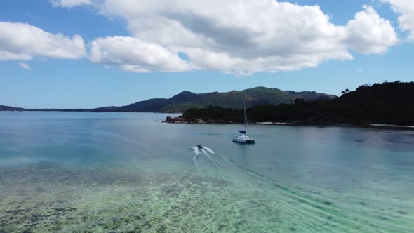 blue ocean with a yacht in the Seychelles