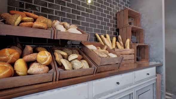 Fresh Bread on Shelves in Bakery alt
