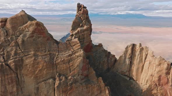 Closeup of the Massive Stone Range of Ship Rock with Purple Sky Behind