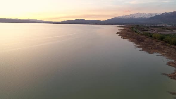 Aerial view along shoreline of Utah Lake as construction is in progress