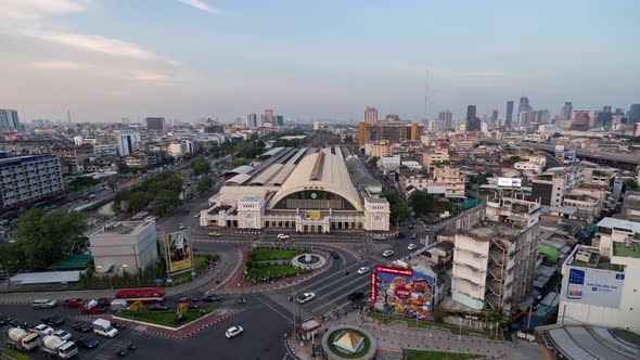 Time lapse of Aerial view of Hua Lamphong or Bangkok Railway Terminal Station with skyscraper