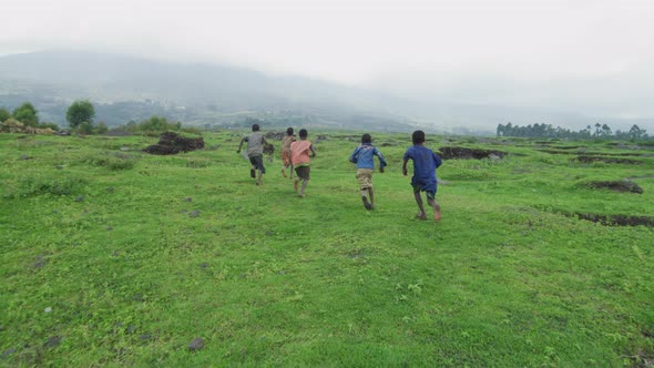 African children running on fields