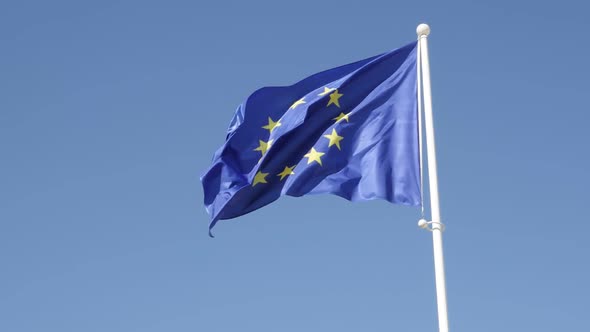 Recognizable EU federation  symbol on flag pole floating on wind slow-mo 1920X1080 HD footage - Flag