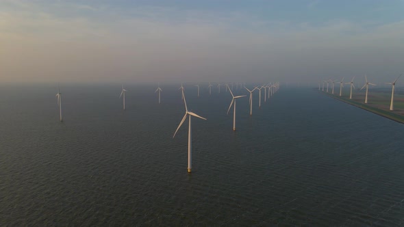 Windmills for Electric Power Production Netherlands Flevoland Wind Turbines Farm in Sea Windmill