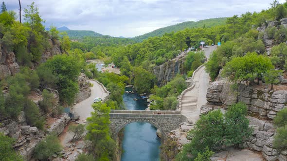 Tourists on Old Bridge in Koprulu Canyon