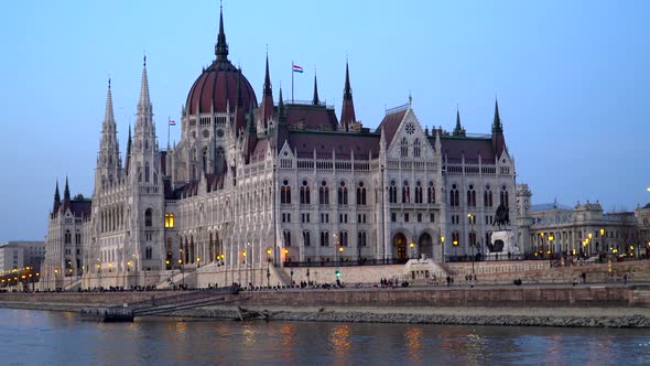 Budapest Parliament and the Danube at sunset