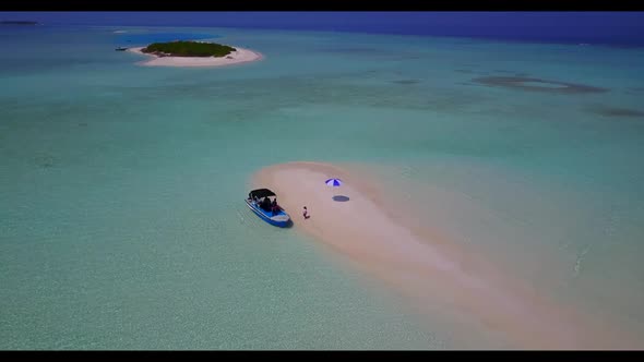 Aerial seascape of idyllic coastline beach holiday by clear water with white sand background of a da