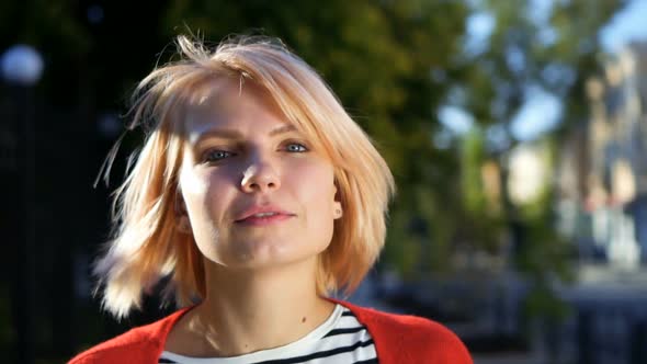 Portrait of Young Beautiful Blonde Woman Outdoors