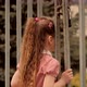 Family Having Fun In Park. Little Girl Looking Through Fence Grate On City Panorama. - VideoHive Item for Sale