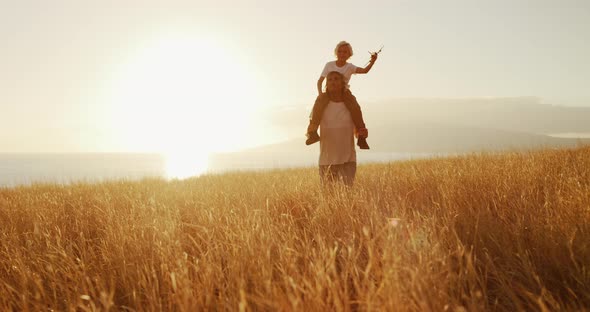 Father, son, and sunset