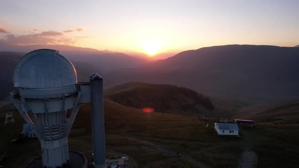 Two Large Telescope Domes at Sunset