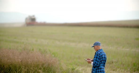 Farmer Using Digital Tablet Agriculture