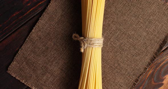 Bunch of Spaghetti on Burlap Textile