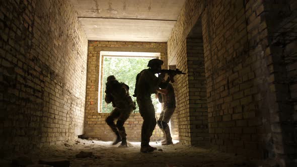 Soldiers Storming Building Occupied By the Enemy