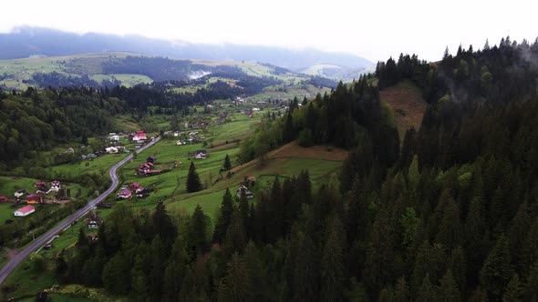 Village in the Mountains. Slow Motion. Carpathians. Ukraine. Aerial