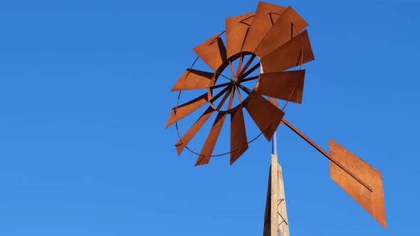 A Tower with a Fan on an African Farm It Rotates with the Help of Wind Force