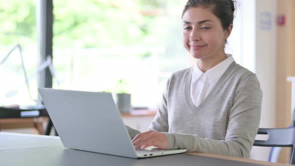 Disapproving Indian Woman with Laptop Showing No Sign 