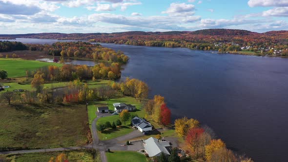 waterfront home in the nice fall colours and mountains