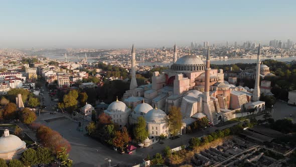 Hagia Sophia Holy Grand Mosque (Ayasofya Camii) with Bosphorus and city skyline on the background