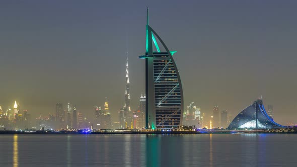 Skyline of Dubai By Night with Burj Al Arab From the Palm Jumeirah Timelapse Hyperlapse