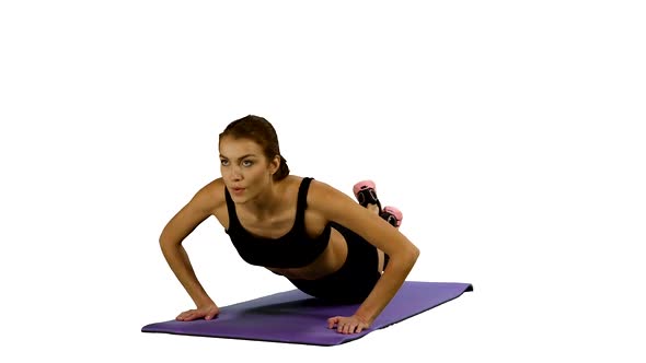 Woman in a Traditional Yoga Pose, White Background, Stretching. Gym