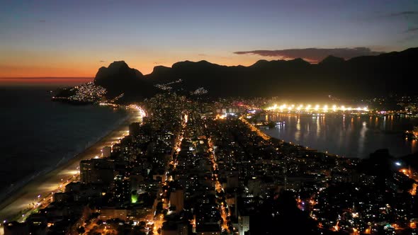 Sunset skyline city of Rio de Janeiro, Brazil. Landmark Ipanema beach.