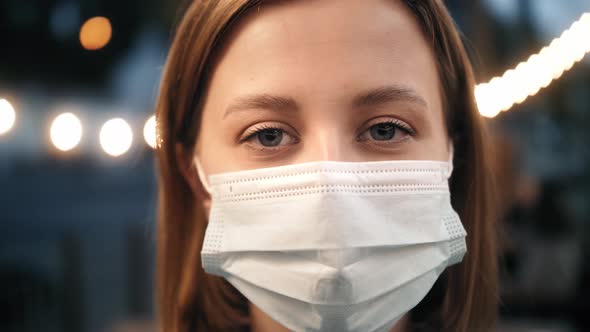 Beautiful Girl Wearing Medical Mask During Coronavirus COVID19 Epidemic