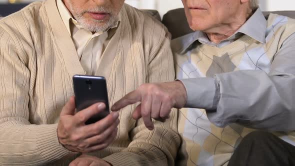 Two Old Men Using Smartphone Closeup, Mobile Banking Application, Technology