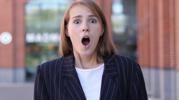 Wondering Business Woman in Shock Astonished