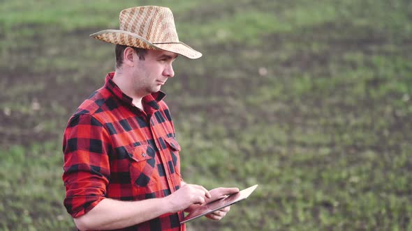 Smart Agriculture Technology Farmer Holding Tablet with Smart Technology