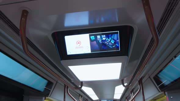 Closeup View of Subway Car Ceiling with Illumination and Display