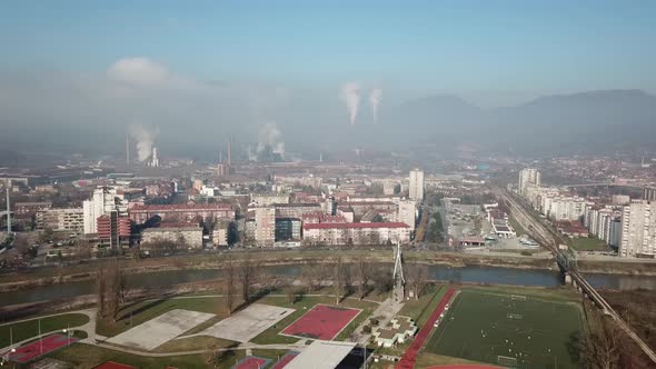 Aerial Shot Of The Factory And Chimney In The City