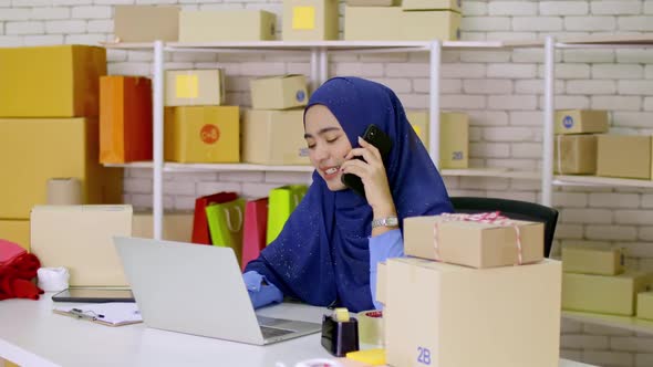 A young Muslim woman who started a small business. freelance entrepreneur working from home