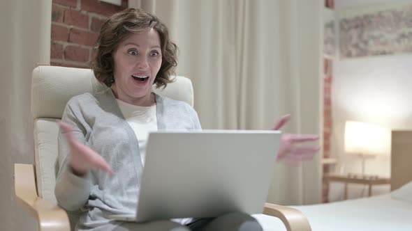 Sick Old Woman Coughing on Sofa