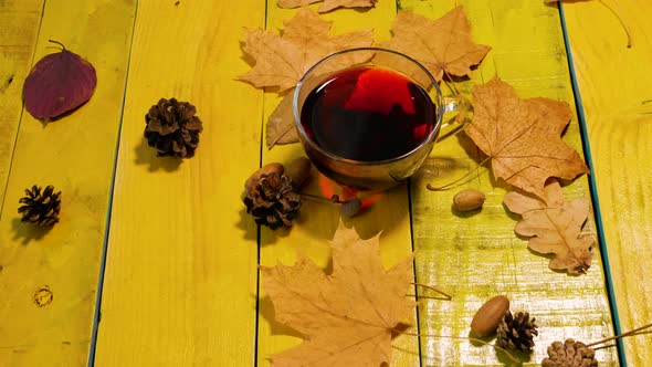 Fragrant Tea In A Mug On An Autumn Table With Yellow Foliage. Beautiful Vintage Autumn Background.