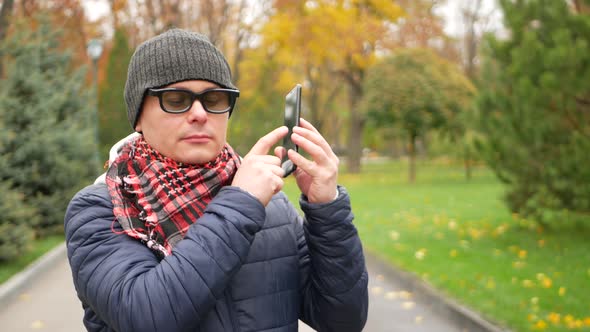 Blind Man With Disability Using Digital Assistant