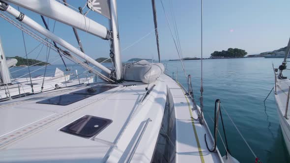 Exterior view of a sailboat boat deck and lifeboat dinghy.