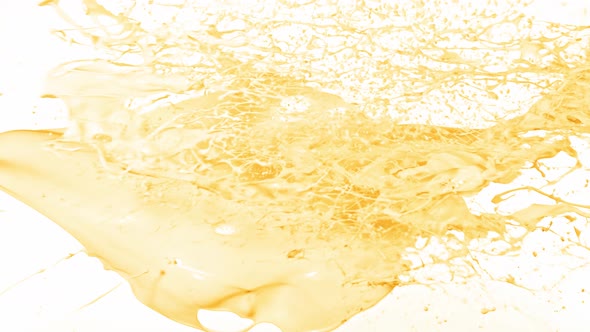 Super Slow Motion Shot of Splashing Vanilla Milk at 1000Fps.