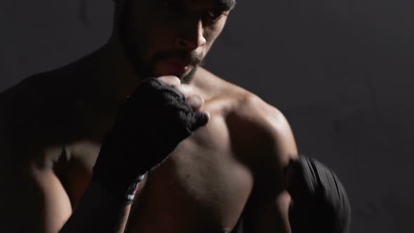 Biracial Boxer Fighting in the Boxing Gym, Fighter Standing in Base Position