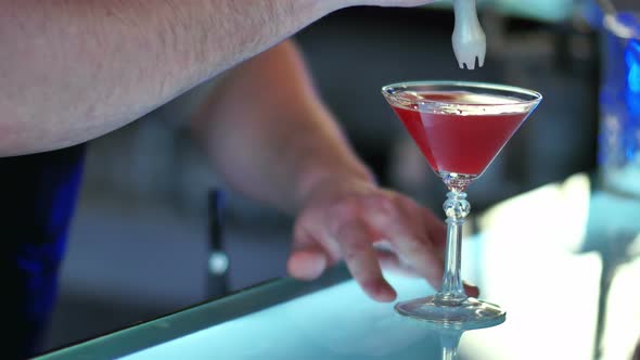 Barman Serving Cocktail