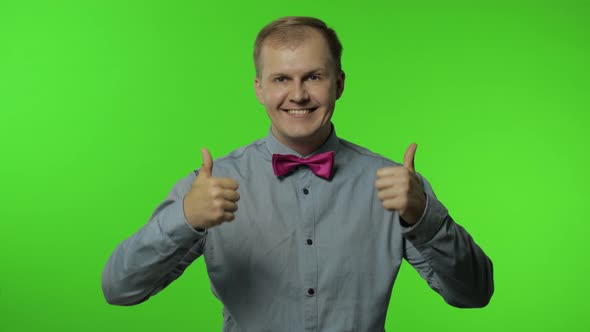 Man Showing Thumbs Up Sign, Smiling, Laughing, Satisfied with Excellent Result, Good Service
