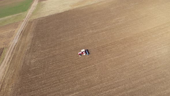 Tractor Plowing Agricultural Field